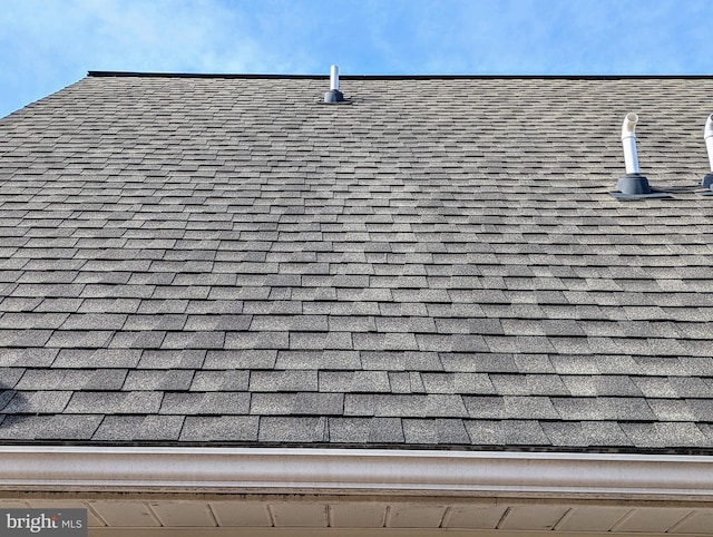 details featuring a shingled roof