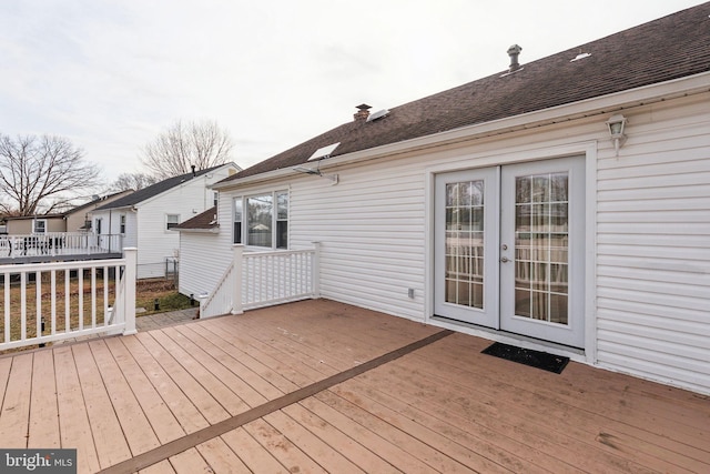 wooden terrace featuring french doors