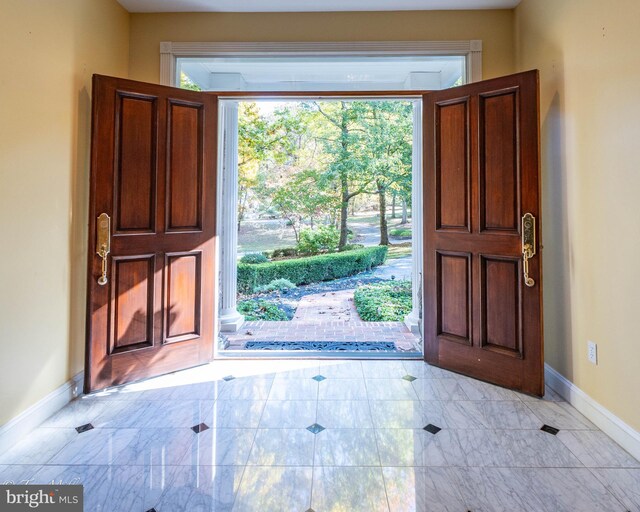 entrance foyer with baseboards