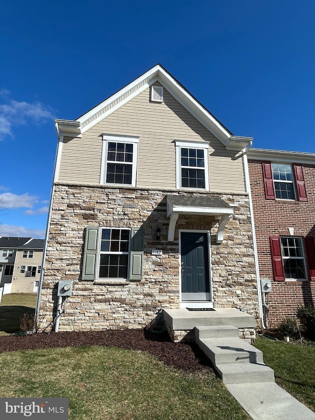 view of front of house featuring stone siding