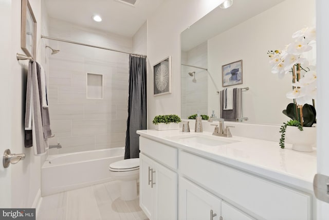 3006 Weber Pl, Oakton, VA 22124 - bathroom featuring vanity, toilet, shower / bathtub combination with curtain, and recessed lighting