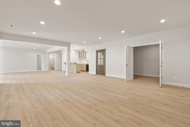 3006 Weber Pl, Oakton, VA 22124 - unfurnished living room featuring recessed lighting, light wood-type flooring, and baseboards