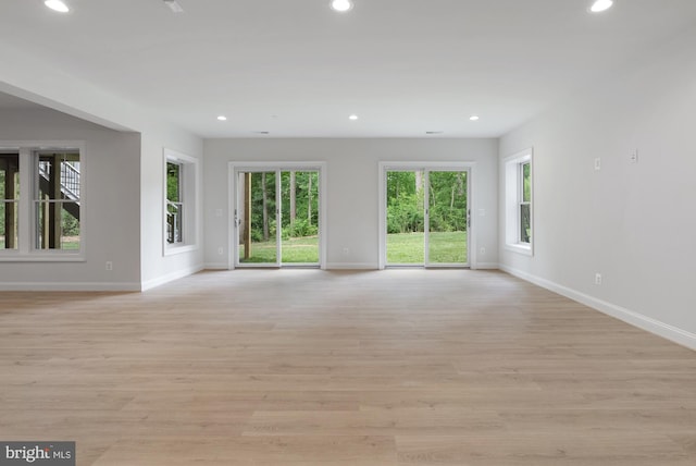 3006 Weber Pl, Oakton, VA 22124 - empty room with baseboards, recessed lighting, and light wood-style flooring
