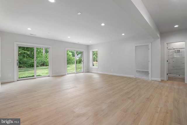 3006 Weber Pl, Oakton, VA 22124 - unfurnished living room featuring baseboards, recessed lighting, and light wood finished floors