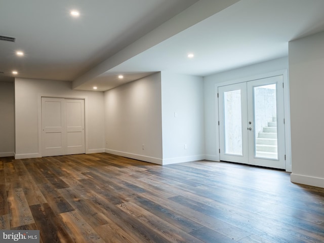 interior space featuring visible vents, baseboards, recessed lighting, dark wood-type flooring, and french doors