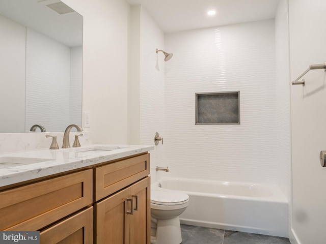 bathroom with shower / bath combination, toilet, and vanity