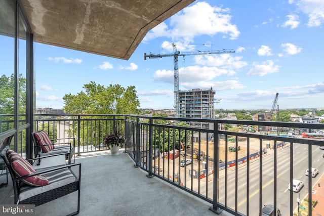 balcony featuring a view of city