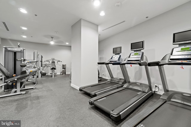 gym with recessed lighting and baseboards