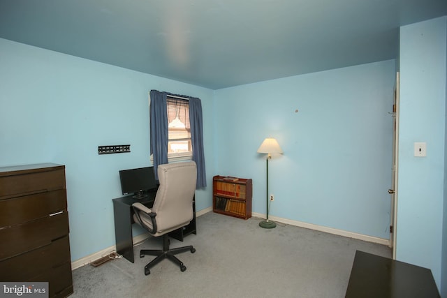 office with baseboards and carpet flooring