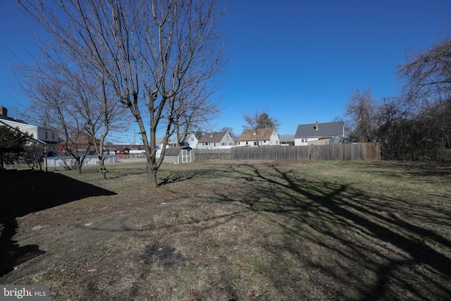 605 Neck Rd, Burlington, NJ 08016 - view of yard featuring fence, a storage unit, an outbuilding, and a residential view