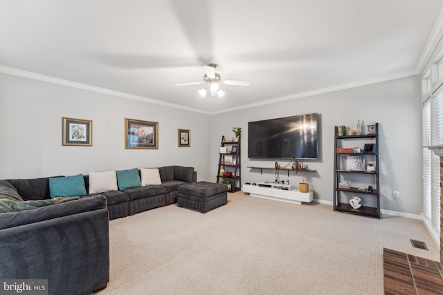 living room with carpet, visible vents, crown molding, a ceiling fan, and baseboards