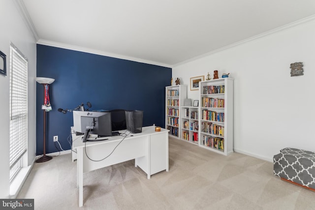carpeted office with ornamental molding and baseboards