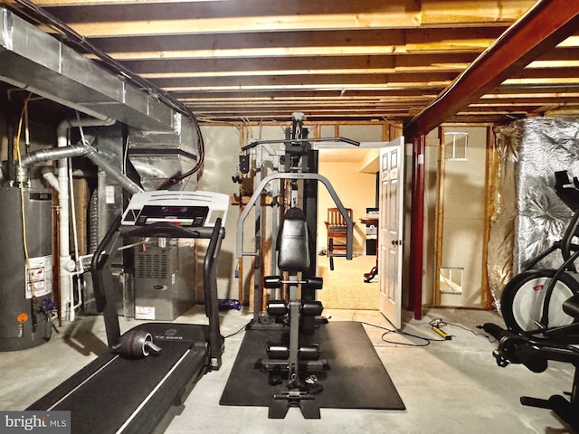 workout area featuring gas water heater