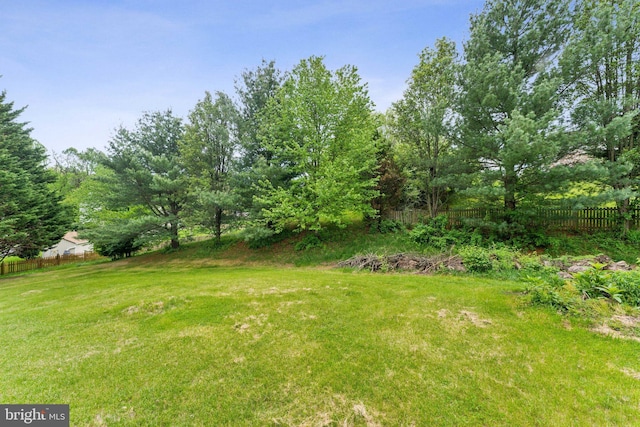 view of yard with fence