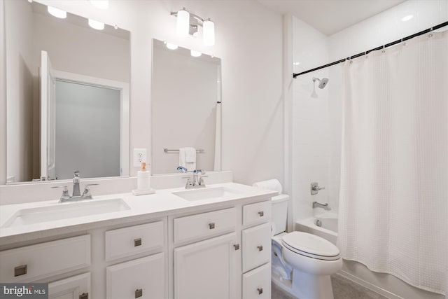 full bathroom with a sink, toilet, shower / bath combo with shower curtain, and double vanity