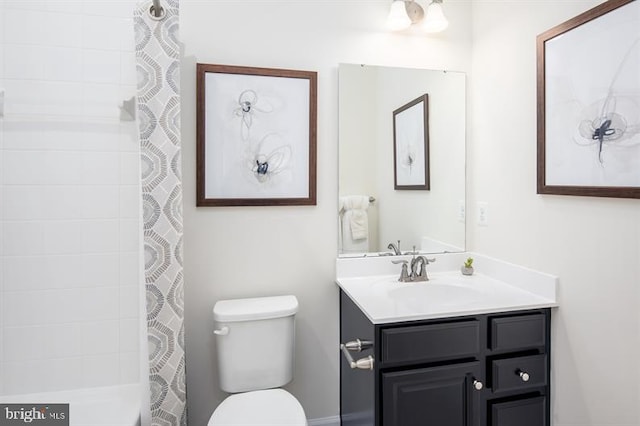 bathroom with a shower with curtain, toilet, and vanity