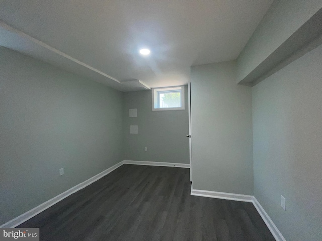 3801 Parkside Dr, Baltimore, MD 21206 - basement featuring dark wood-style floors and baseboards