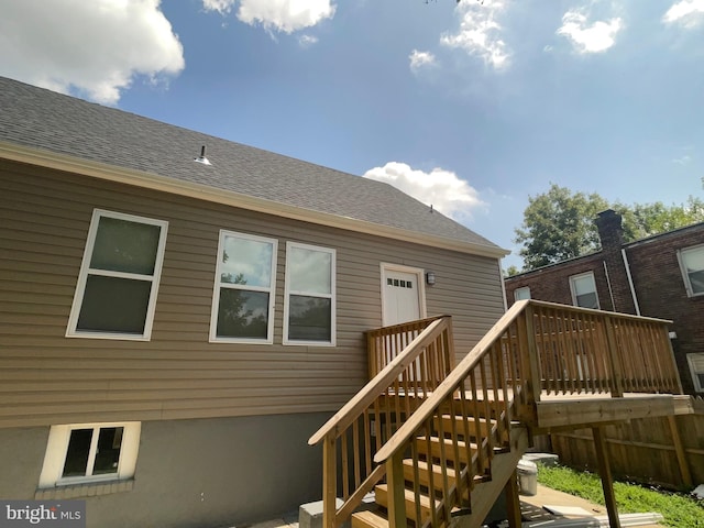 3801 Parkside Dr, Baltimore, MD 21206 - back of house featuring stairway, roof with shingles, and a wooden deck