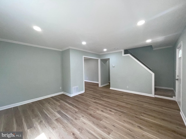 3801 Parkside Dr, Baltimore, MD 21206 - basement with visible vents, baseboards, ornamental molding, wood finished floors, and recessed lighting
