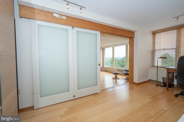 50 Belmont Ave Unit 1010, Bala Cynwyd, PA 19004 - office with rail lighting, light wood-type flooring, and baseboards