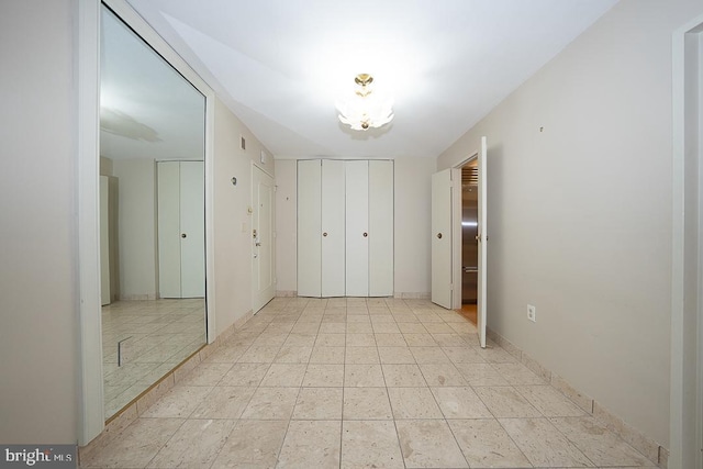 50 Belmont Ave Unit 1010, Bala Cynwyd, PA 19004 - unfurnished bedroom featuring two closets