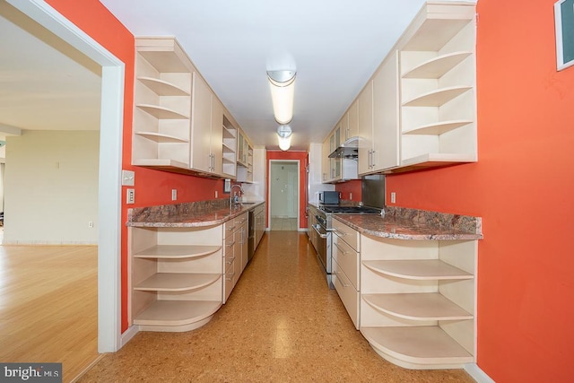 50 Belmont Ave Unit 1010, Bala Cynwyd, PA 19004 - kitchen featuring open shelves, stainless steel appliances, exhaust hood, and dark countertops