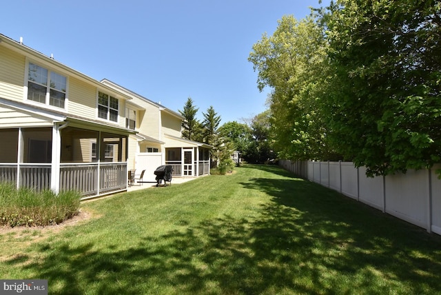 20324 Mallory Ct Unit 49, Rehoboth Beach, DE 19971 - view of yard featuring a sunroom and fence