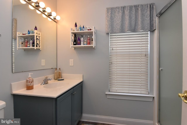 20324 Mallory Ct Unit 49, Rehoboth Beach, DE 19971 - full bathroom with vanity, a shower with shower door, and toilet
