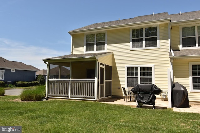 20324 Mallory Ct Unit 49, Rehoboth Beach, DE 19971 - back of house with a lawn, a patio, a shingled roof, and a sunroom