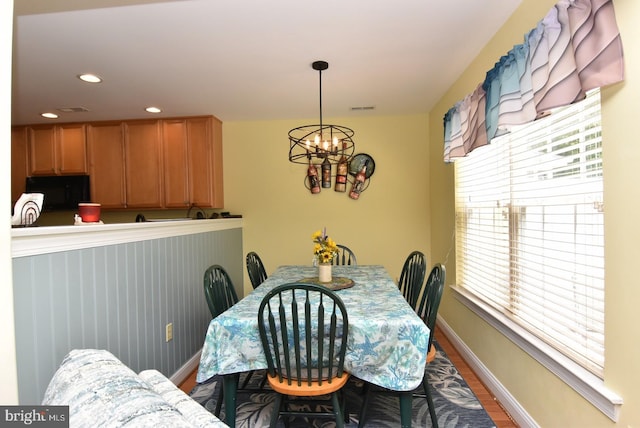 20324 Mallory Ct Unit 49, Rehoboth Beach, DE 19971 - dining room with a chandelier, recessed lighting, baseboards, wood finished floors, and visible vents