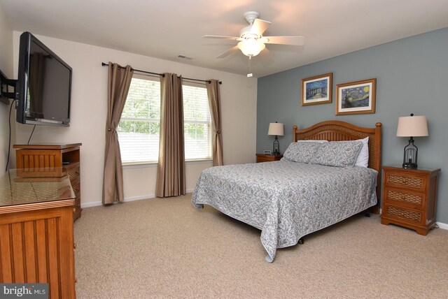 20324 Mallory Ct Unit 49, Rehoboth Beach, DE 19971 - bedroom featuring baseboards, light colored carpet, ceiling fan, and visible vents