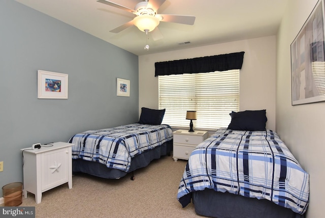 20324 Mallory Ct Unit 49, Rehoboth Beach, DE 19971 - bedroom with ceiling fan, light carpet, and visible vents