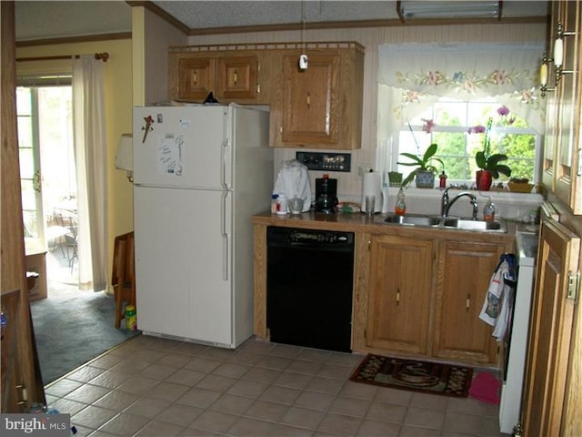 kitchen with ornamental molding, a sink, black dishwasher, freestanding refrigerator, and range