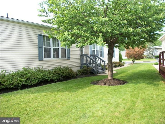 exterior space featuring a front yard