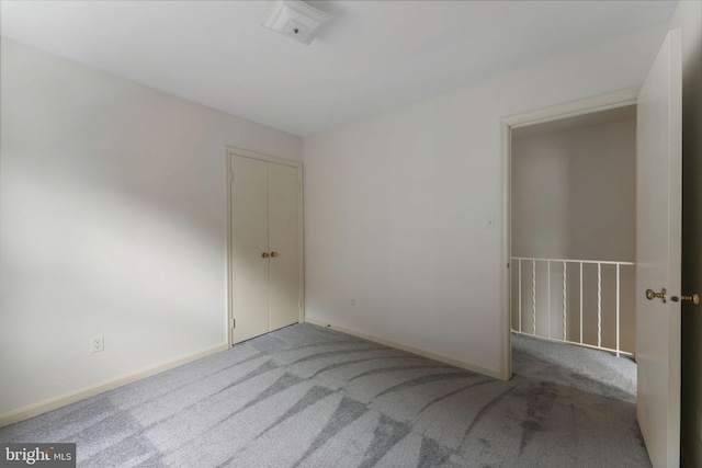 22 E Howell Ave, Alexandria, VA 22301 - spare room featuring carpet and baseboards
