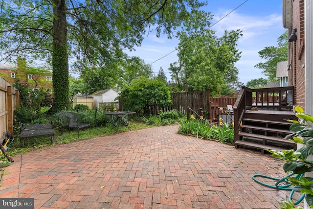 22 E Howell Ave, Alexandria, VA 22301 - view of patio with a fenced backyard and a deck
