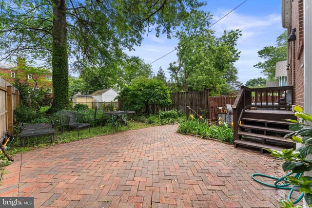 22 E Howell Ave, Alexandria, VA 22301 - view of patio with a fenced backyard and a deck