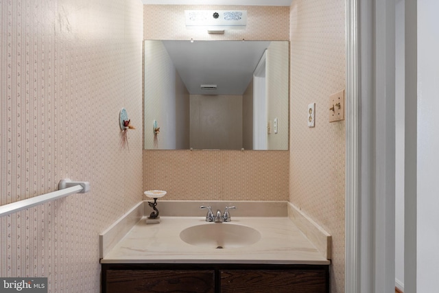 22 E Howell Ave, Alexandria, VA 22301 - bathroom featuring vanity and wallpapered walls