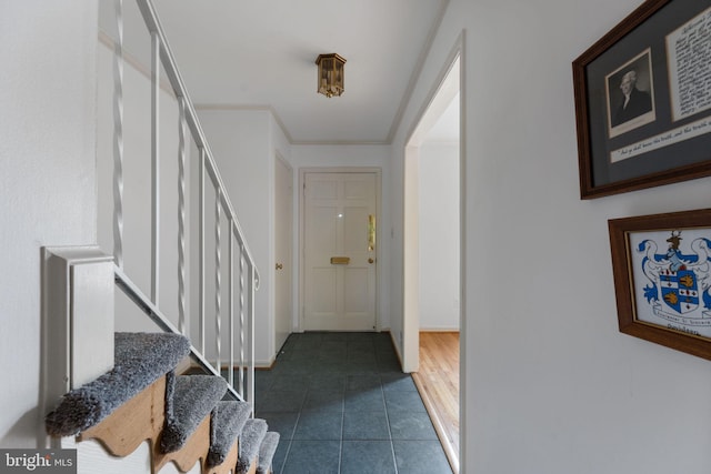 22 E Howell Ave, Alexandria, VA 22301 - entryway featuring stairs, dark tile patterned floors, and baseboards