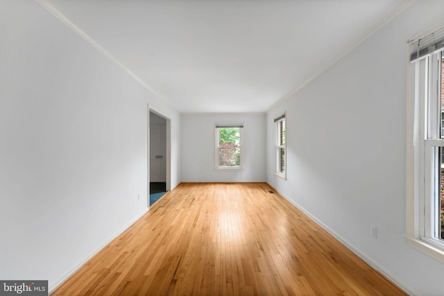 22 E Howell Ave, Alexandria, VA 22301 - spare room featuring crown molding, hardwood / wood-style flooring, and baseboards