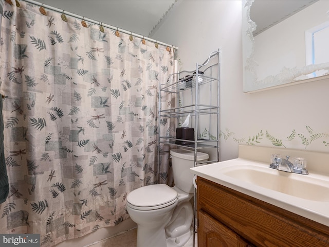 bathroom with vanity, a shower with curtain, and toilet