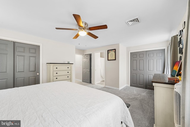 carpeted bedroom featuring visible vents, ceiling fan, and baseboards