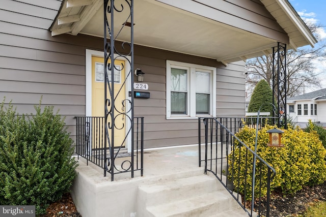 entrance to property with covered porch