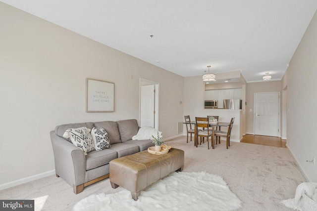 1860 Stratford Park Pl Unit 306, Reston, VA 20190 - living area with light colored carpet and baseboards