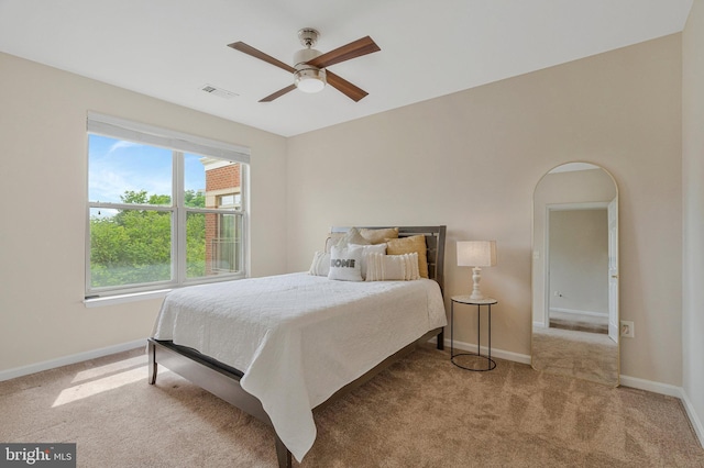 1860 Stratford Park Pl Unit 306, Reston, VA 20190 - bedroom featuring carpet flooring, visible vents, baseboards, and ceiling fan