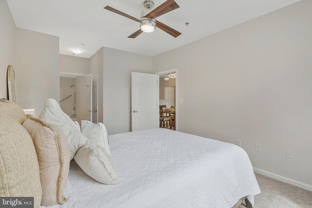 1860 Stratford Park Pl Unit 306, Reston, VA 20190 - carpeted bedroom with ensuite bath, ceiling fan, and baseboards