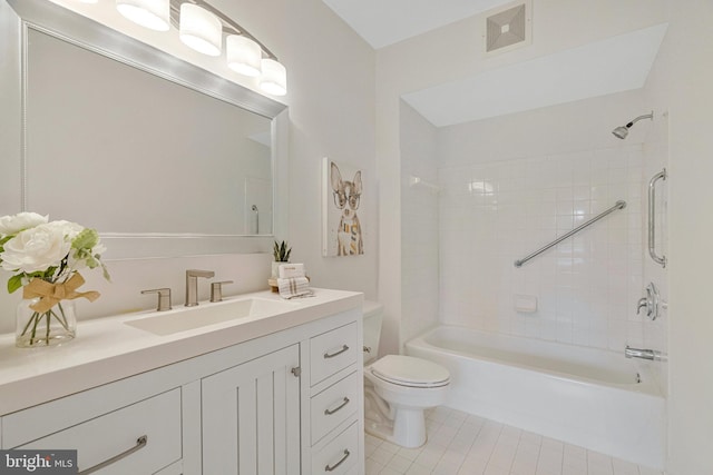 1860 Stratford Park Pl Unit 306, Reston, VA 20190 - bathroom with toilet,  shower combination, visible vents, tile patterned floors, and vanity
