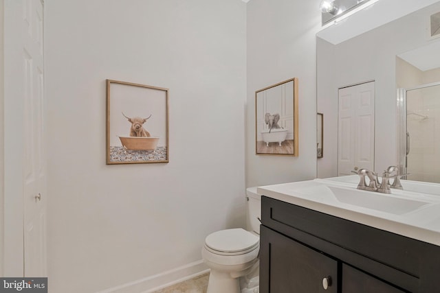 1860 Stratford Park Pl Unit 306, Reston, VA 20190 - full bathroom with toilet, vanity, tile patterned floors, a shower with door, and baseboards