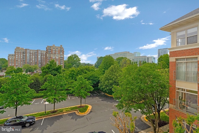 1860 Stratford Park Pl Unit 306, Reston, VA 20190 - exterior space featuring uncovered parking and a city view