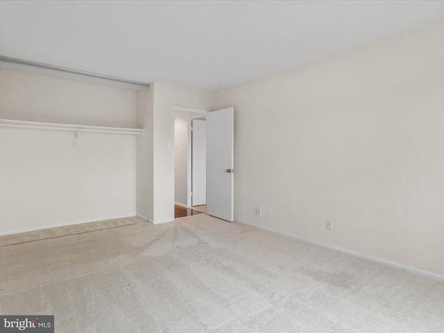 309 Yoakum Pkwy Unit 1003, Alexandria, VA 22304 - unfurnished bedroom with carpet and a closet
